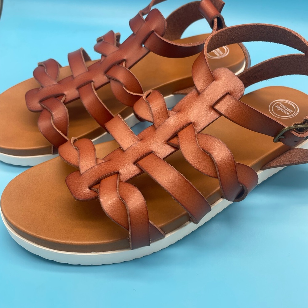 Never worn strappy sandals padded inside faux leather